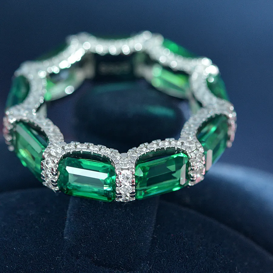 Authentic Eternity's Emerald Embrace: Moissanite‑Adorned Silver Band of Love
