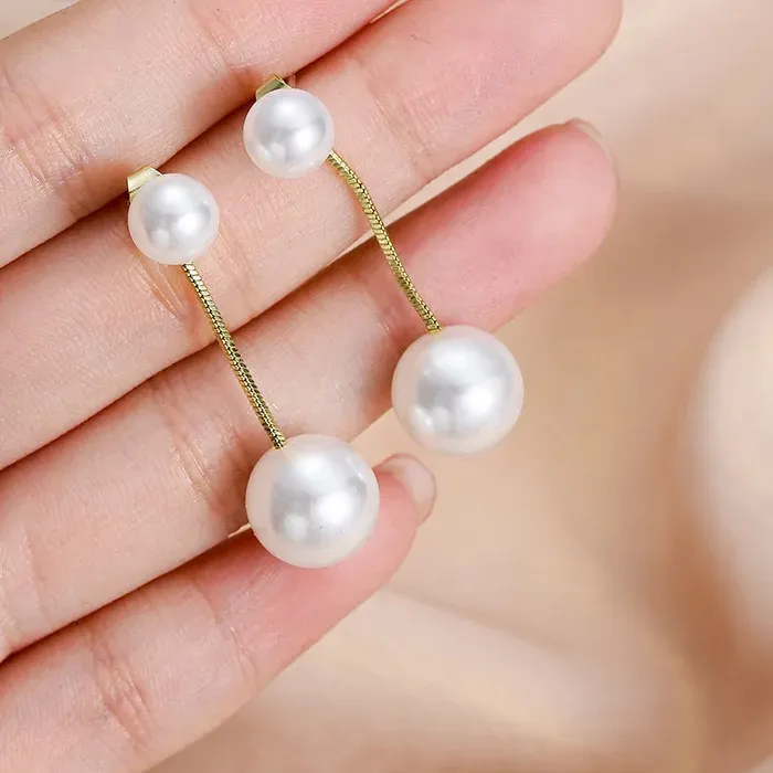 Authentic Luminous Cascades: The Celestial Pearl Tassel Earrings