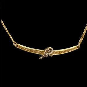 Authentic Nina Ricci Luminous Monogram Choker in Gleaming Gold