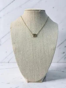 Authentic Embracing Elegance: GIVENCHY's Mysterious G Logo Pendant