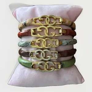 Authentic The Serpent's Gilded Embrace: Quintet of Vintage Gucci Snakeskin Bangles in 24KT Gold