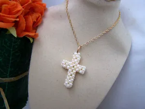 Authentic Radiant Luminescence: The Golden Seed Pearl Crucifix