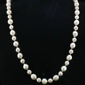 Authentic Pearls of Protection: Lustrous Freshwater Pearl Necklace with Golden Shield