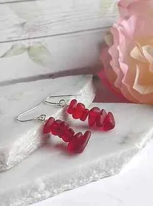 Authentic Tides of Serenity: Red Pebble Shaped Frosted Sea Glass Amulet