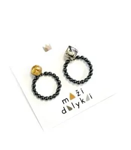 Authentic Eclipsed Resonance Black Porcelain and 24 Karat Gold Studs