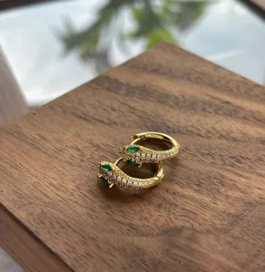 Authentic Serpentine Gaze Gold-Plated Huggie Earrings