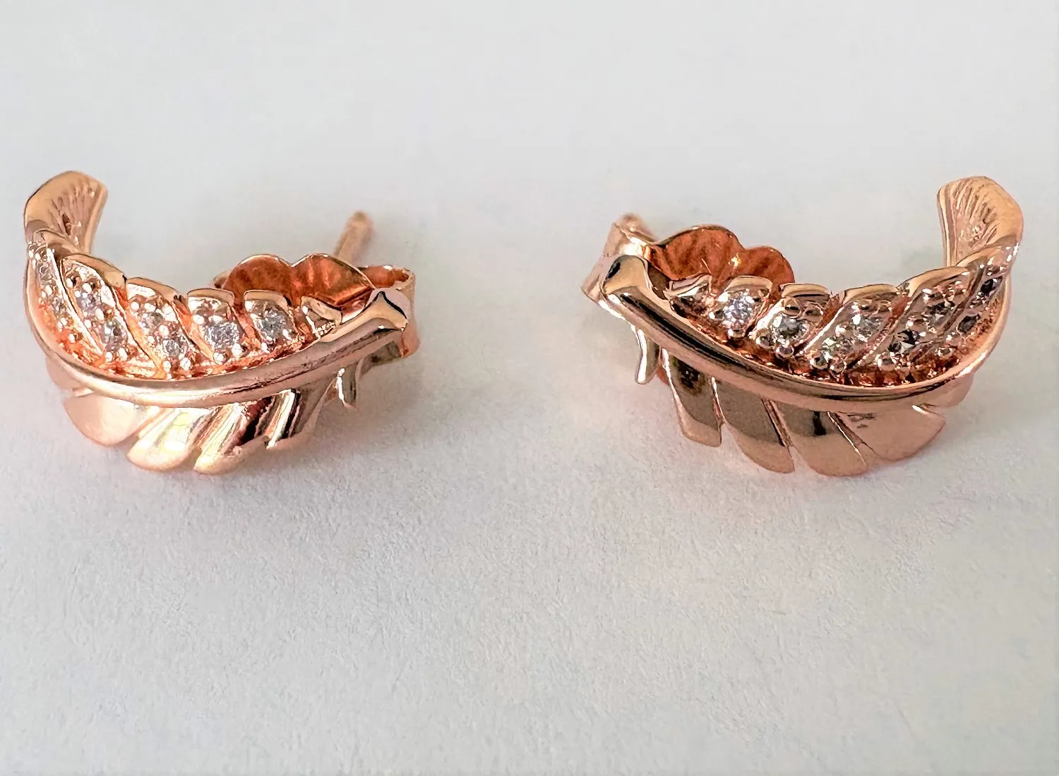 Authentic Celestial Feather Whisper Talisman – Gold‑Plated Floating Curve Earrings Encrusted with Starlight CZ