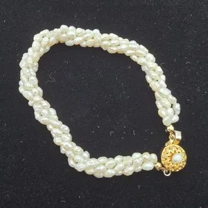 Authentic Radiant Luminescence: The Five-Strand Cultured Rice Pearl Talisman