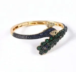 Authentic The Gilded Peacock Radiant Bangle of Grace and Vision