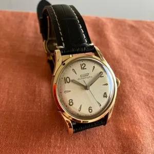 Authentic The Tissot Chronos-Bumper: A Golden Vessel of Temporal Flow