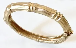 Authentic Golden Resilience: The Vintage Ciner Brushed Bamboo Talisman