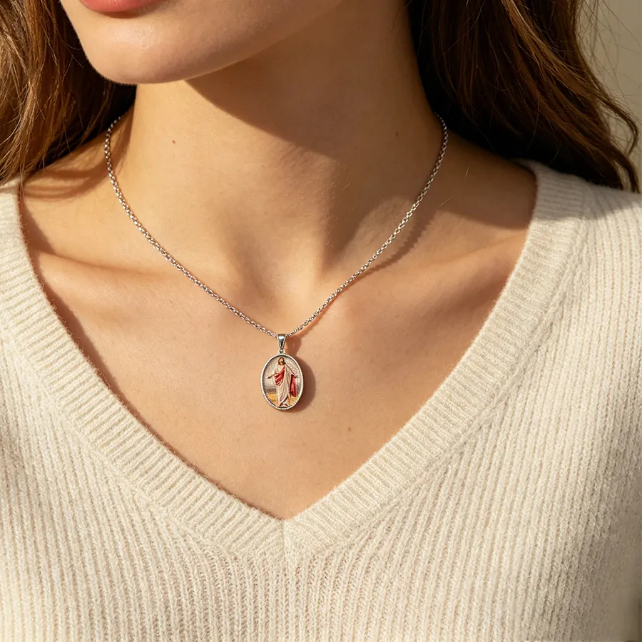 Authentic Cradle of Compassion: Open‑Armed Christ Pendant of Sacred Light