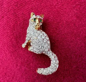 Authentic The Gilded Familiar: Swarovski Gold-Plated Crystal Kitten Brooch with Emerald-Green Eyes