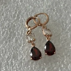 Authentic Crimson Flame Pear-Cut Lab-Created Garnet Dangle Earrings in Radiant Yellow Gold Finish