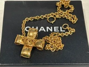 Authentic The 1994 Chanel Sacred Cross Talisman in Radiant Gold-Plated Finish