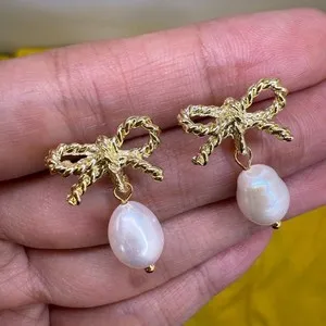 Authentic Luminous Bows of Celestial Grace: Freshwater Pearl Drop Earrings