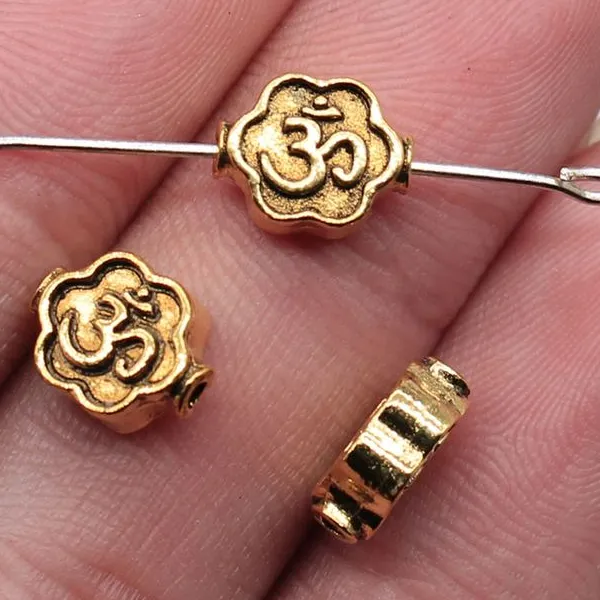 8x4mm Antique Gold Om Hole Beads